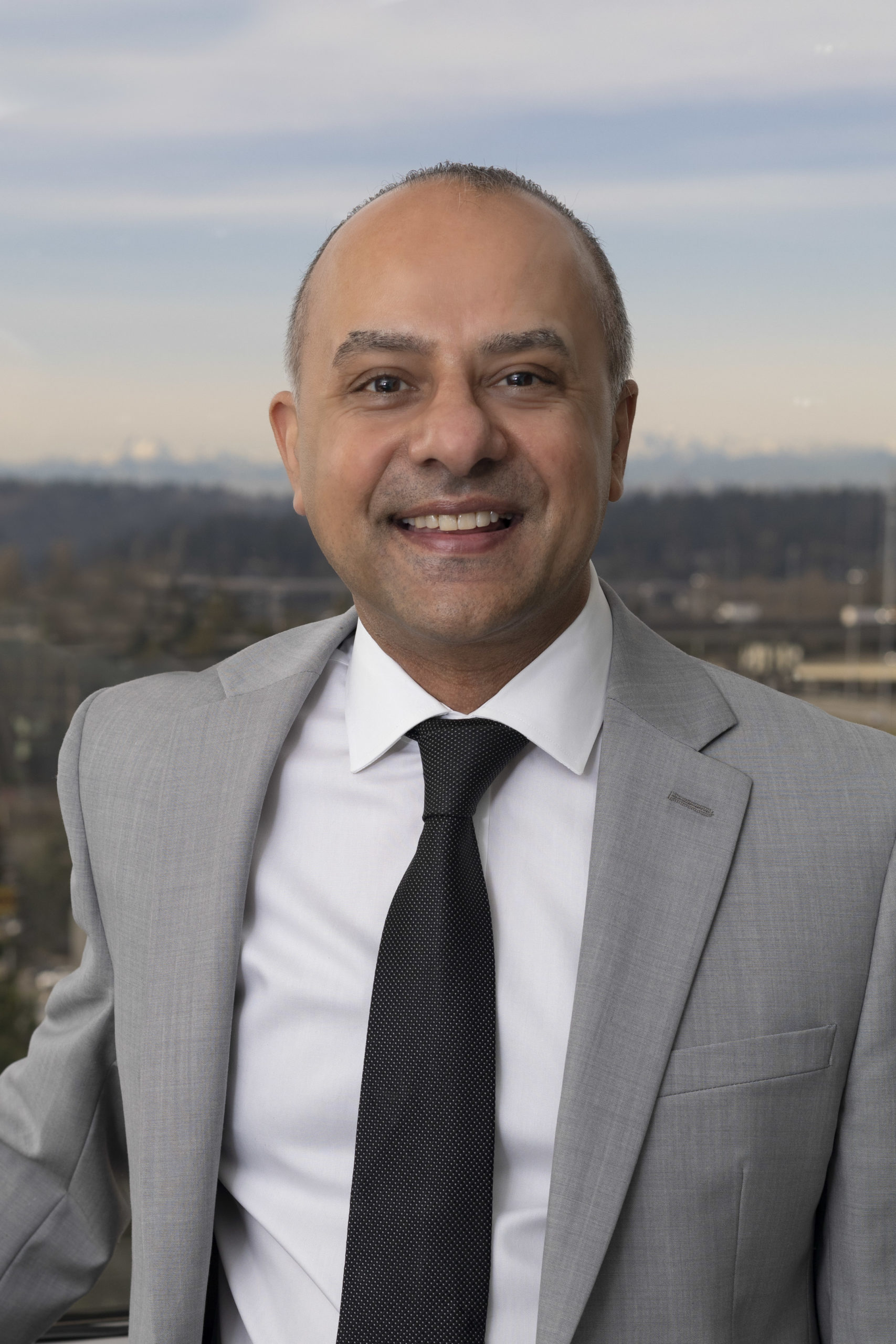 Santokh Gill, President & Chief Executive Officer