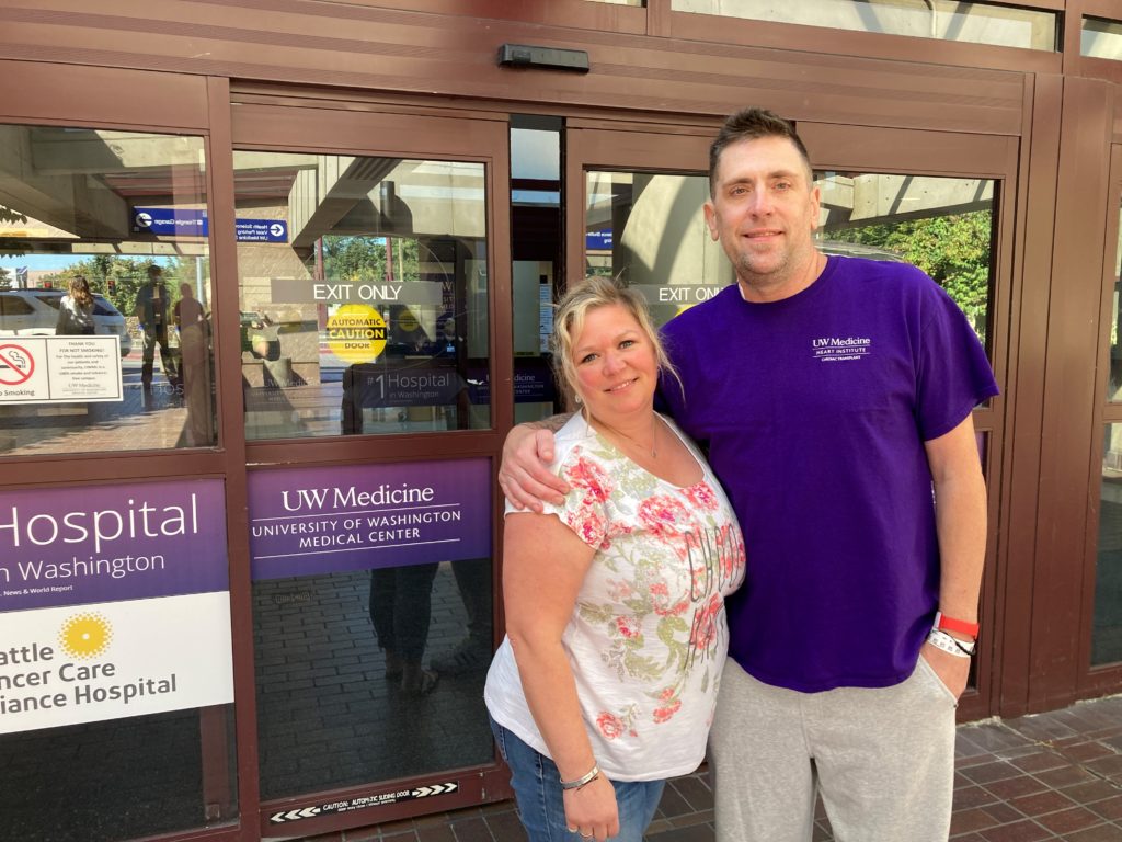 Ryan Stovall (right) received the Pacific Northwest's first donation-after-circulatory-death (DCD) heart transplant. He and his wife, Misty, stand together outside of UW Medical Center.